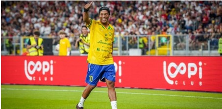 Ronaldinho and his samba dance on the field.
